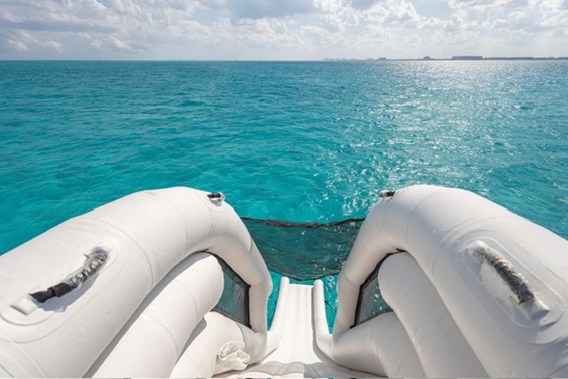 Inflatable water slide on the luxury yacht