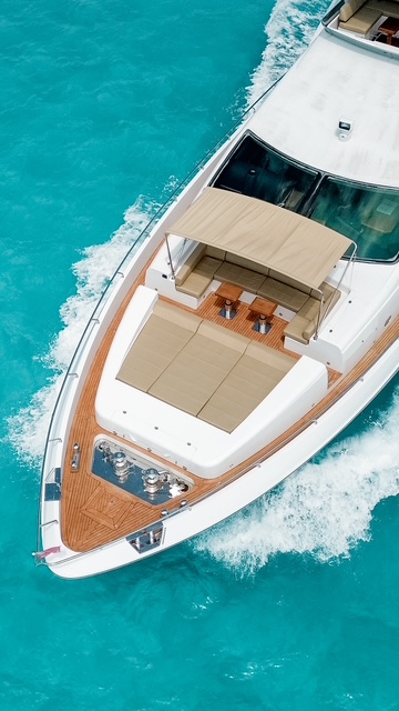 Shaded padded aft deck of the Azimut 95