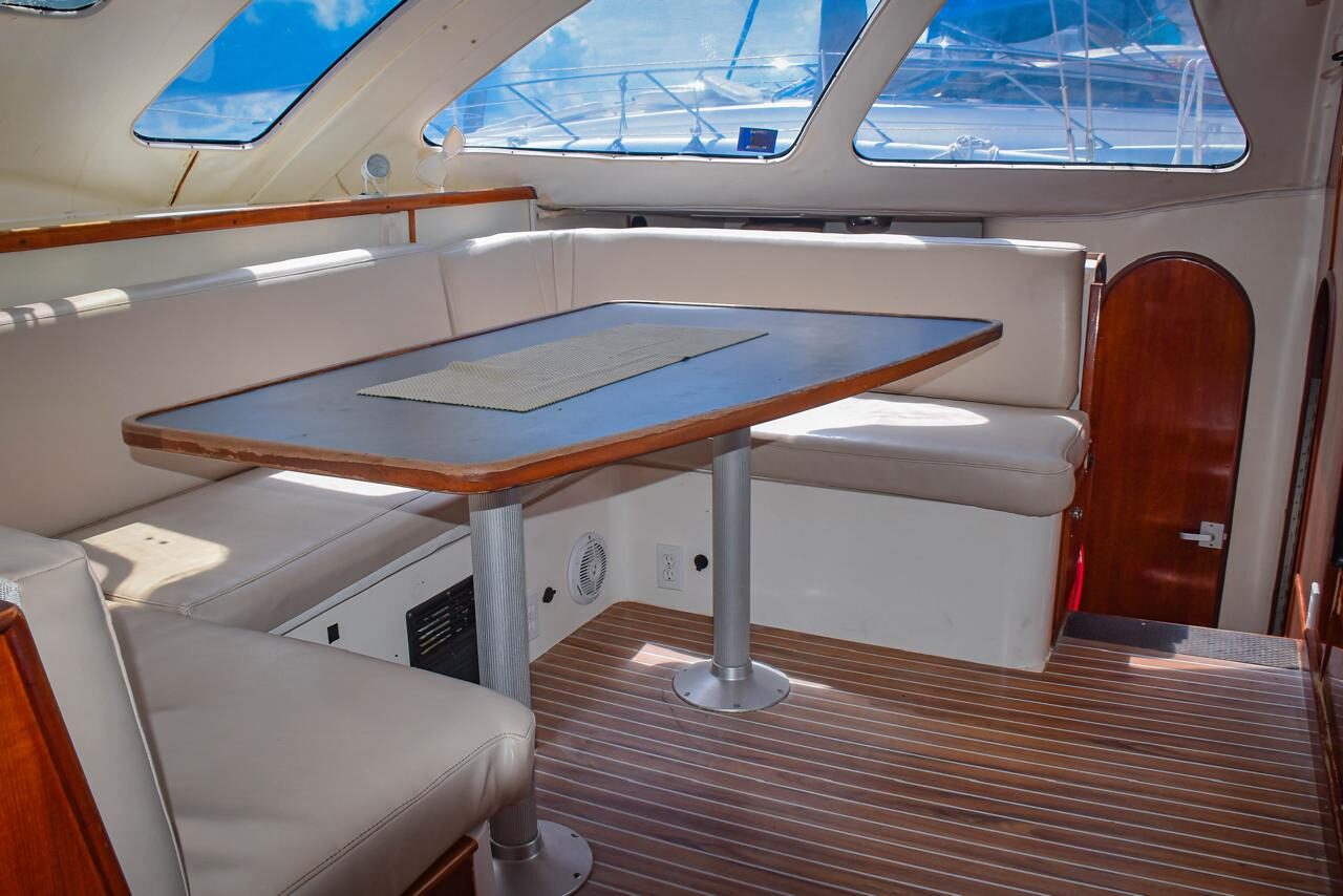 Indoor dining table on the Miami Beach catamaran