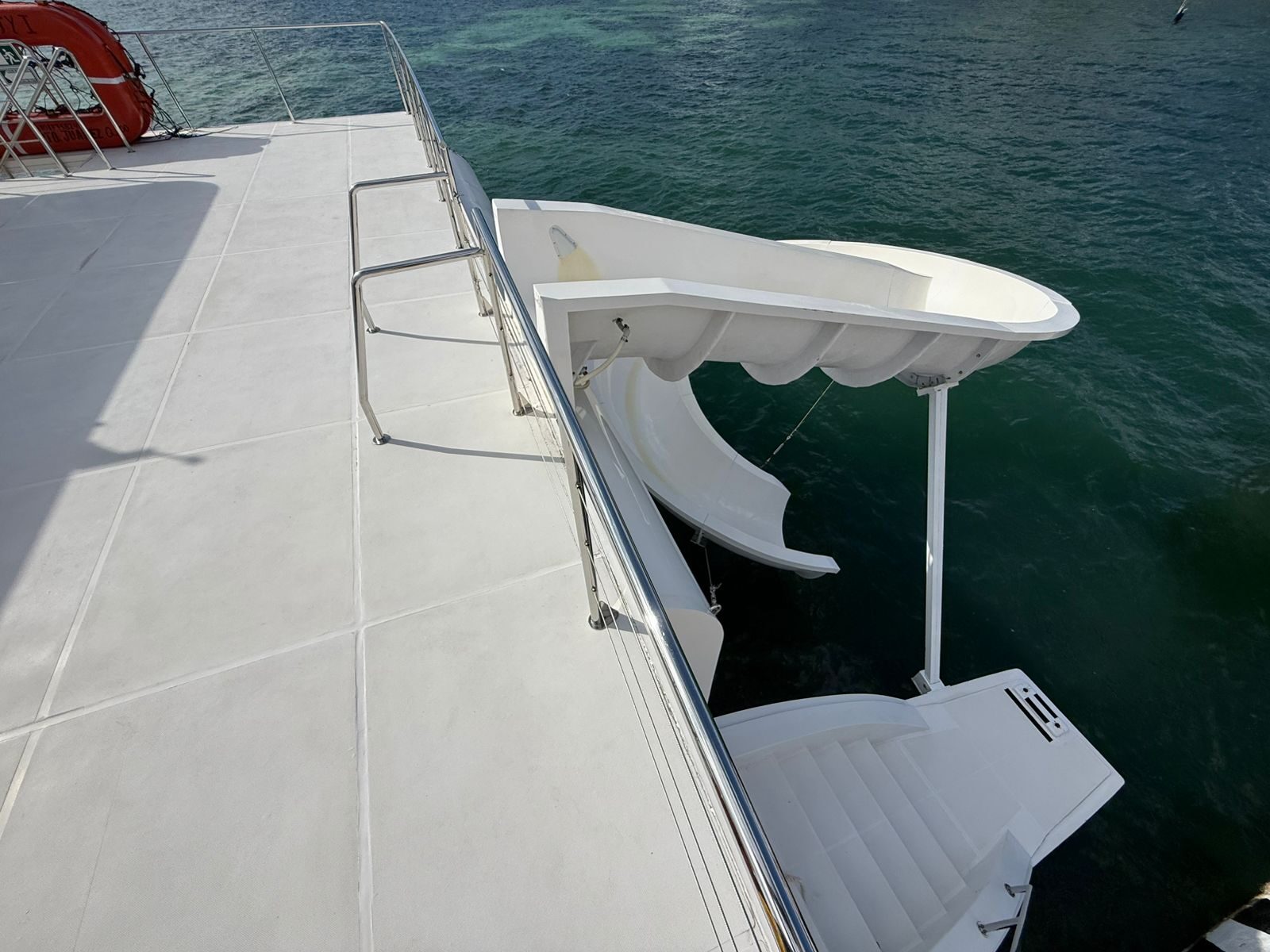 Water slide off the stern of the party boat